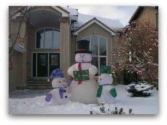 Inflatable snowmen are a very popular item in recent years. Snowman picture of Frosty and his kids.