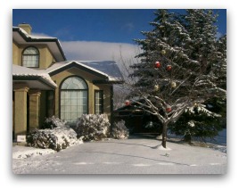 This homeowner uses large decorative Christmas bulbs effectively for a simple, but more traditional look..