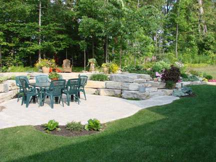 A patio surround made with large placement stones.