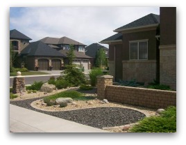 Two tone design for decorative rock in front yard.