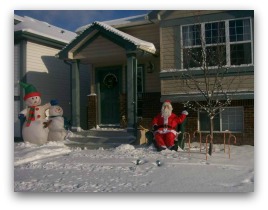 Santa is moveable and waves to the kids as they pass by.