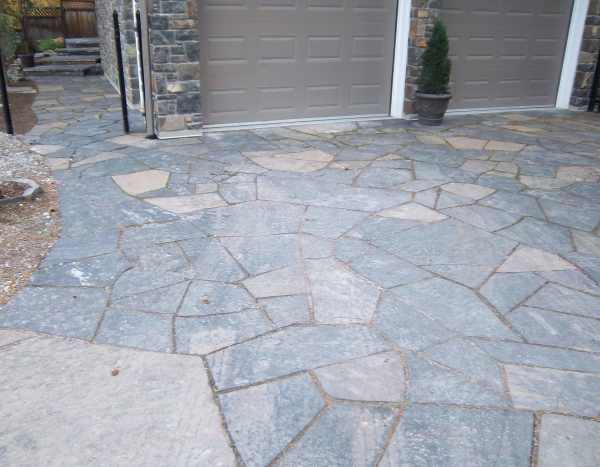 Landscaping driveways with natural stone is one of the most appealing ways to increase curb appeal.