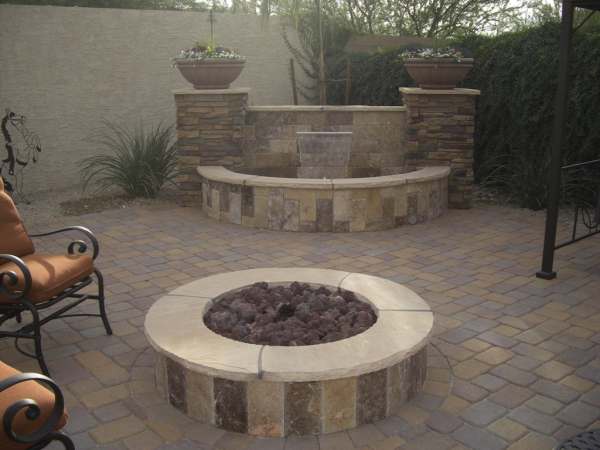 A formal firepit area in a private corner, makes a nice place to retreat for an evening.
