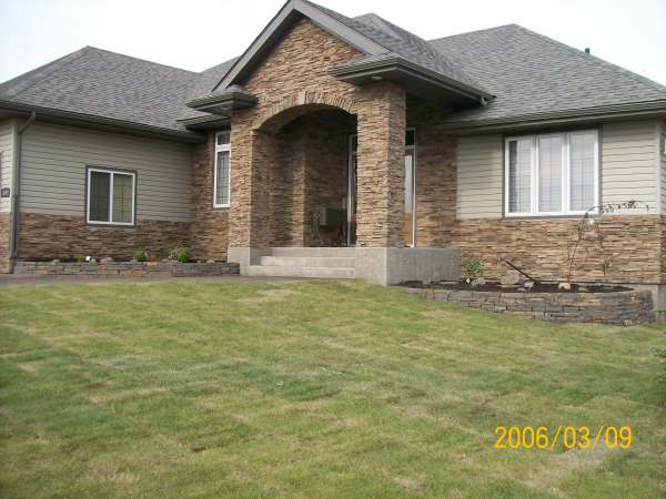 These two walls were added to give balance to the front of the house with plantings on both sides.