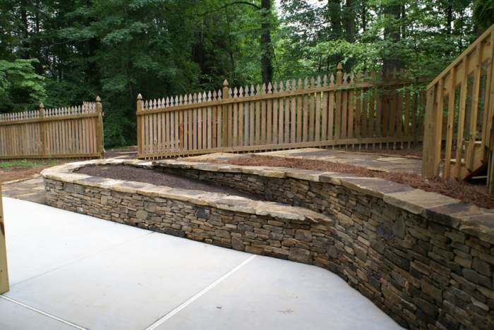 Retaining walls are great ways to make more usable space in a yard.
