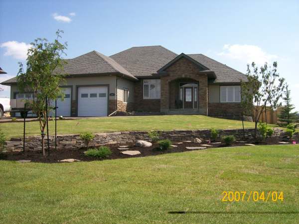 The slope in this yard was a great opportunity for a natural stone wall. 