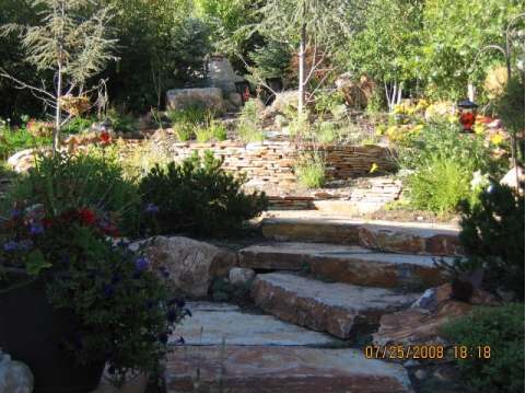 Stone slabs are a great feature for hillside landscaping.