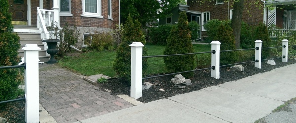 These older round metal rail style fences are not quite as common as they once were.