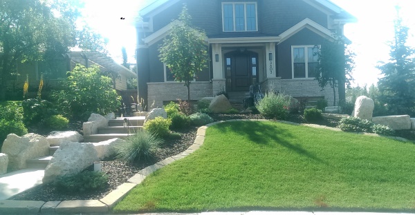 Mow over edging is a great way to border garden beds. These edges are easy to maintain while keeping clean lines.