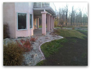 This picture shows the new sod, old lawn, and the soil over top of the old lawn. Blending lawn requires patience.