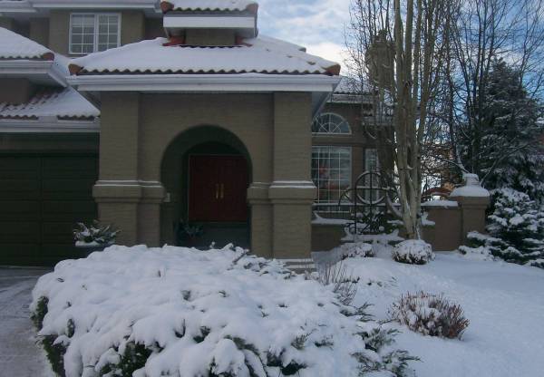 A well designed front yard with a small courtyard.